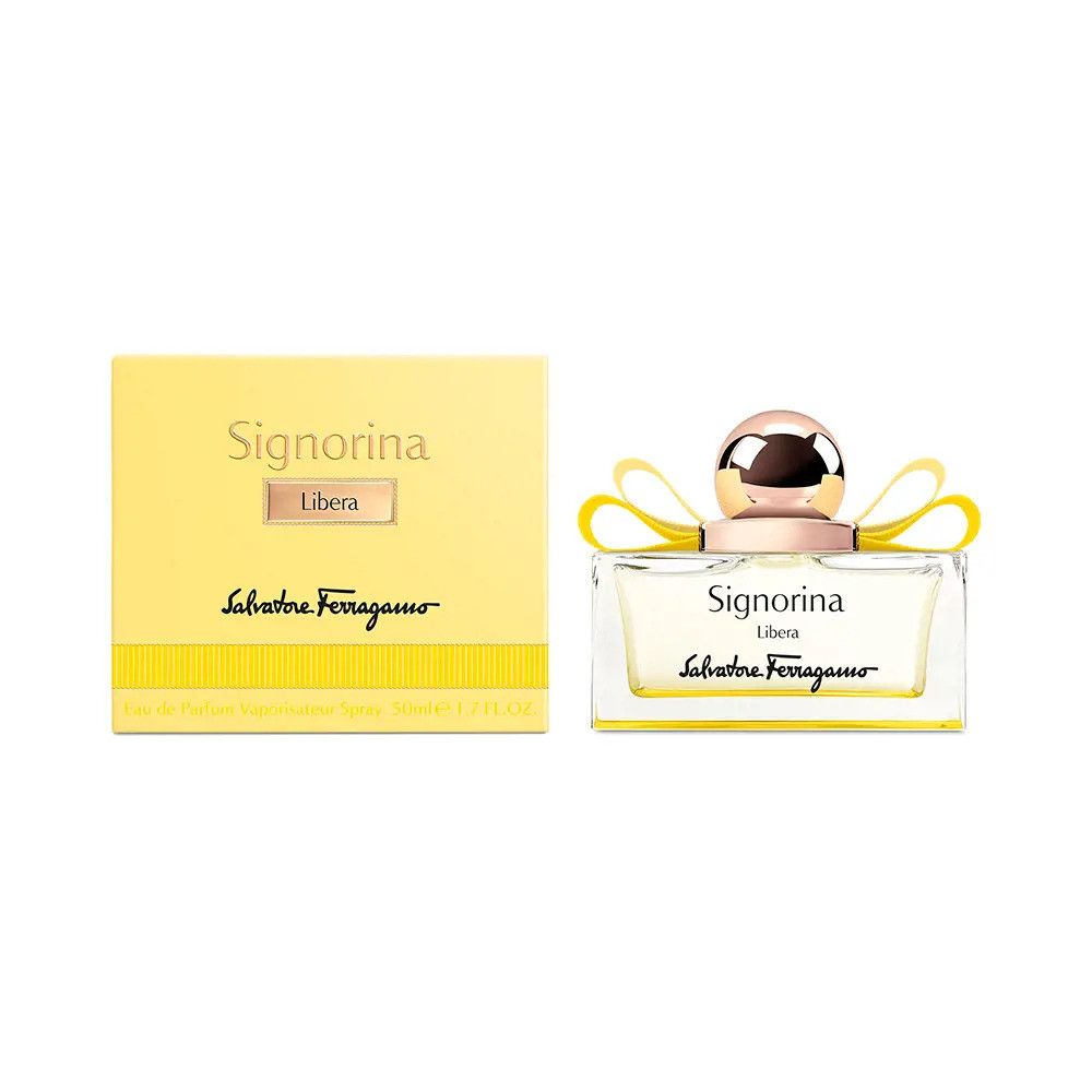Gelbe Verpackung und Flakon. Flakon mit gelber Flüssigkeit, goldfarbenem Verschluss und gelber Schleife. Schriftzug Signorina Libera.