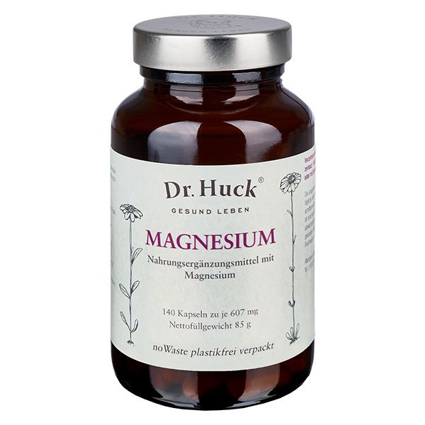 Braune Glasflasche mit "Dr. Huck Magnesium". Aufschrift: "140 Kapseln". Nahrungsergänzungsmittel mit Magnesium.