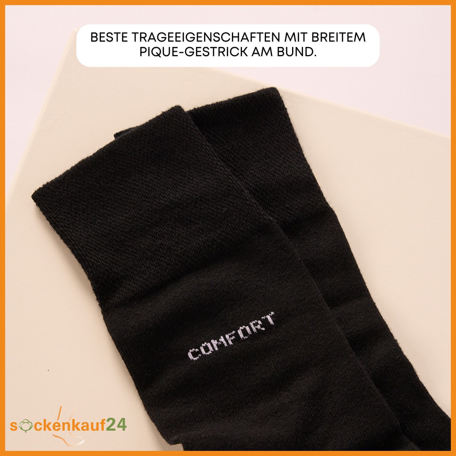 Nahaufnahme schwarzer Socken. Aufschrift "COMFORT". Text: "Beste Trageeigenschaften mit breitem Pique-Gestrick am Bund". Logo "sockenkauf24".