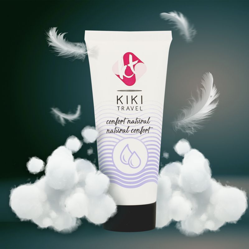 Kiki Travel Gleitgel Tube umgeben von Federn und Watte.
