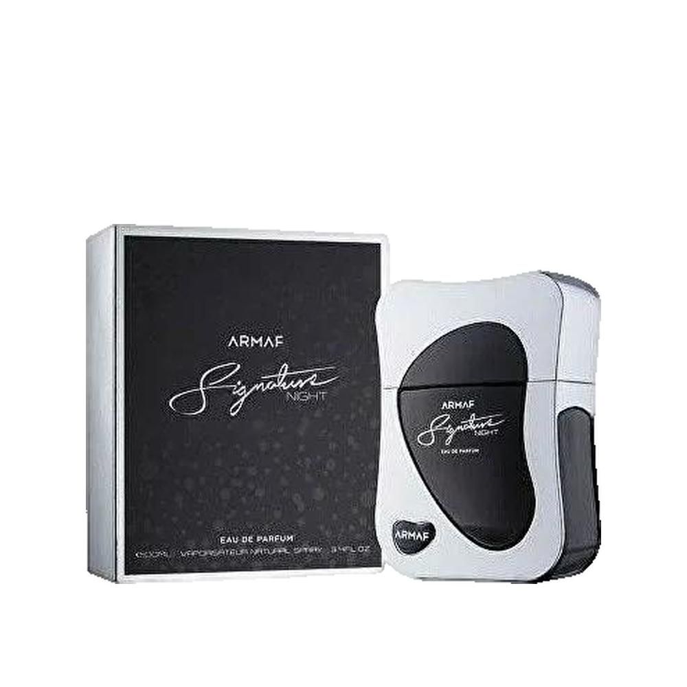 Parfumflakon und Verpackung. Flakon weiß-schwarz, rechteckig, abgerundet. Verpackung schwarz-weiß, Schriftzug.