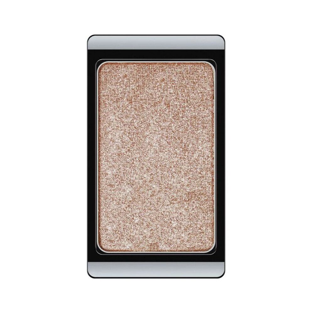 Eyeshadow-Kompakt in rechteckiger Form. Silberner Rahmen, goldfarbener Farbton mit Glitzer.