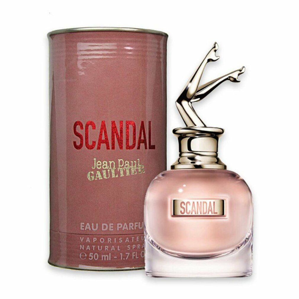 Parfümflakon und Verpackung. Flakon mit goldfarbenen Beinen. Aufschrift: SCANDAL, Jean Paul Gaultier.