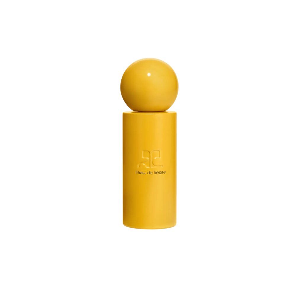 Gelbe Parfumflasche mit Kugelverschluss. Aufschrift: l'eau de liesse. Logo: zwei sich überlappende Buchstaben C.