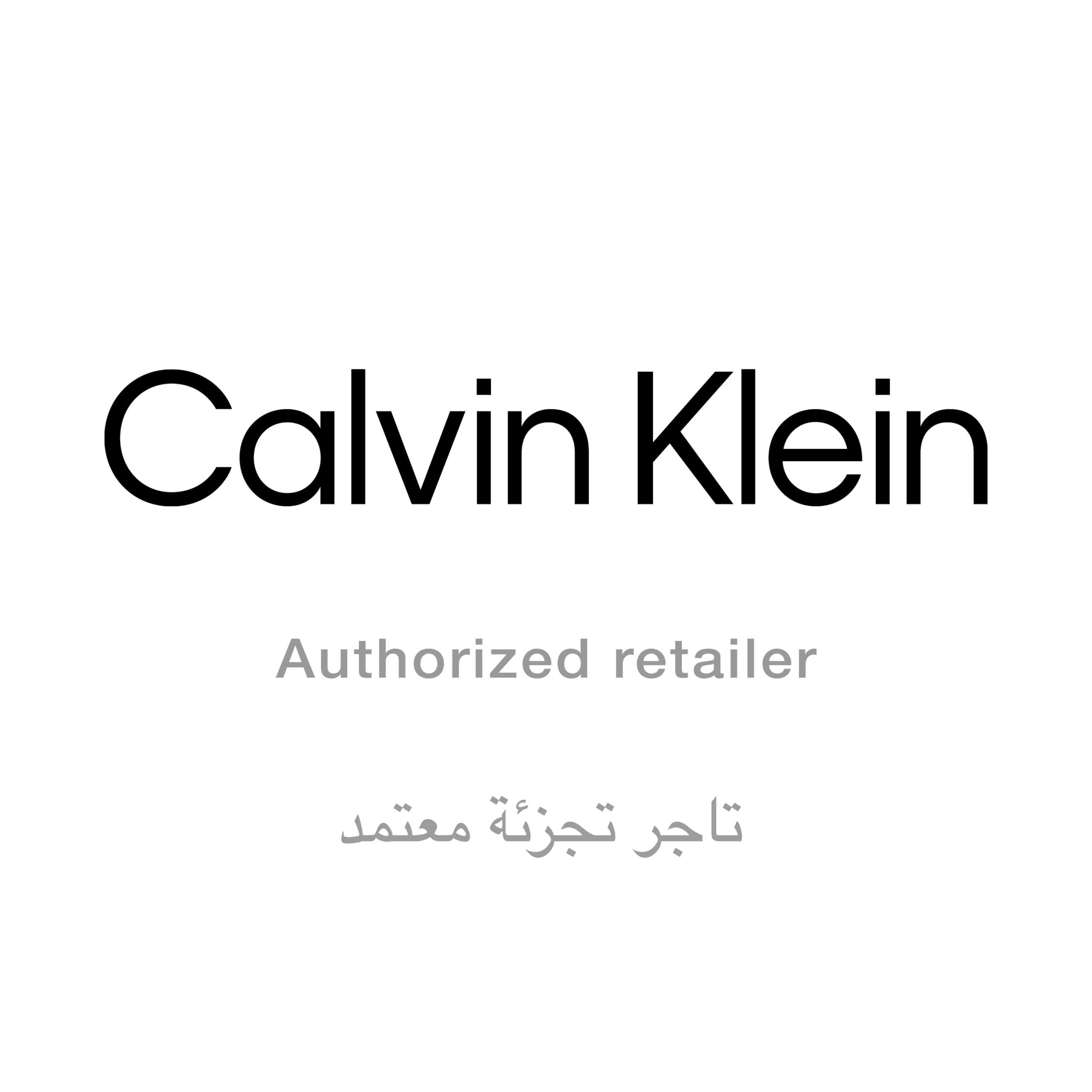Logo von Calvin Klein. Darunter steht „Authorized retailer“ und arabischer Text.
