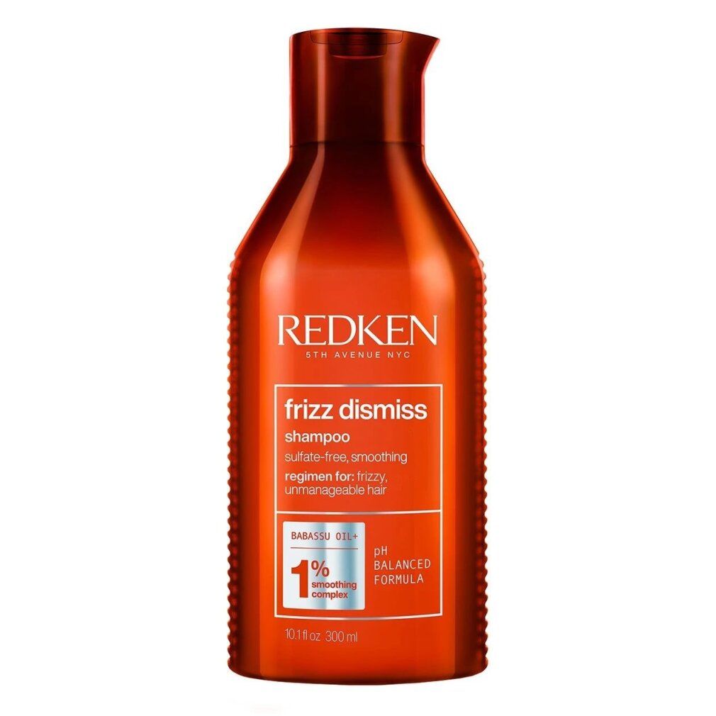 Rote Redken Frizz Dismiss Shampoo Flasche. Text: Frizz Dismiss, Shampoo, pH-ausgewogene Formel, 1% Smoothing Complex.