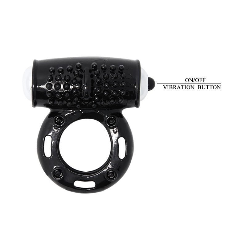 Schwarzer Vibrationsring mit Noppen und einem Vibrator-Aufsatz. Beschriftung: ON/OFF Vibrationstaste.