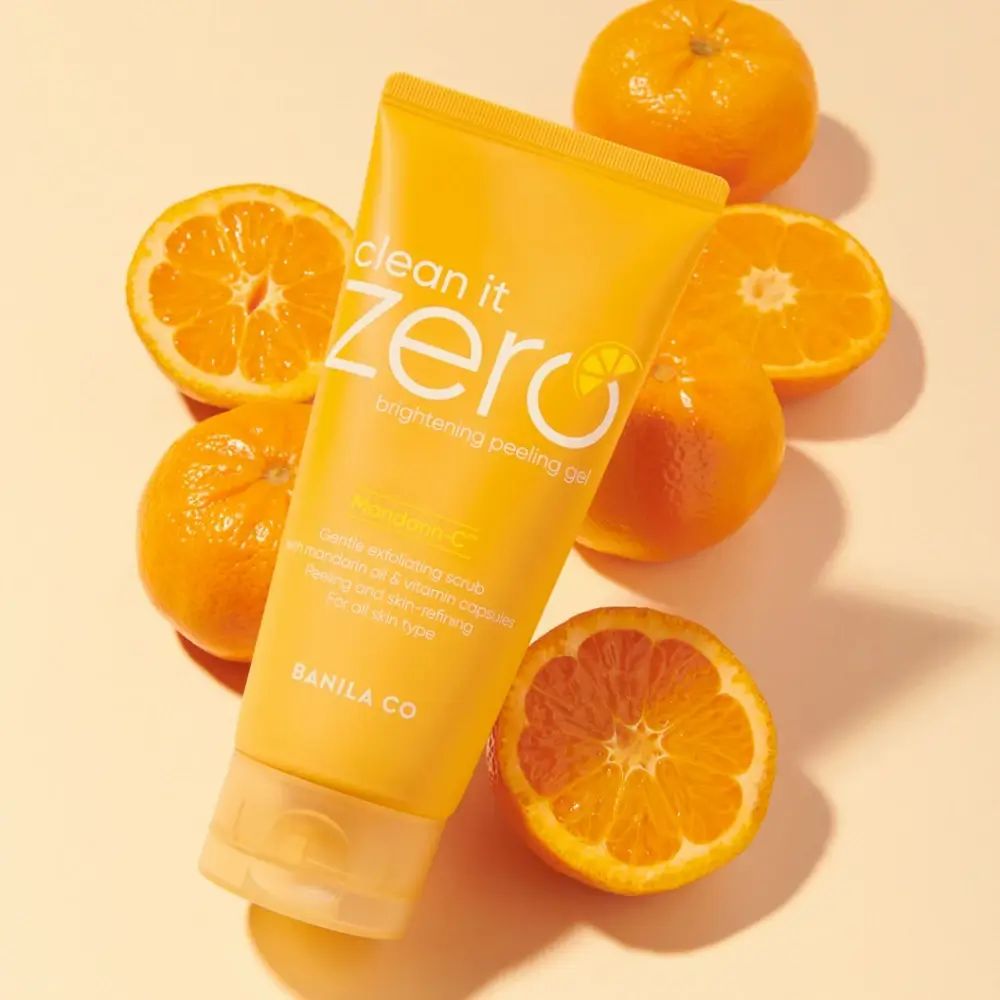 Gelbes Peeling-Gel in einer Tube mit Orangen und Orangenscheiben.