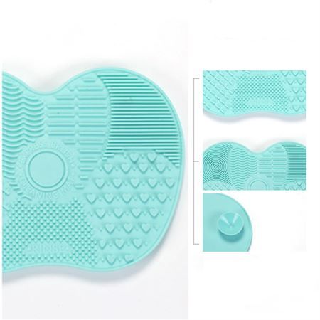 Türkisfarbene Silikonmatte mit verschiedenen Reinigungsflächen für Make-up-Pinsel.