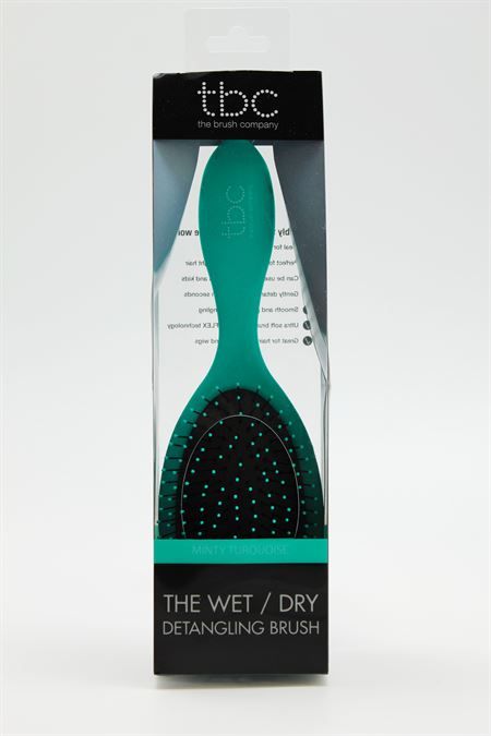 TBC Wet & Dry Haarbürste in Mintgrün-Türkis, verpackt in durchsichtiger Hülle.