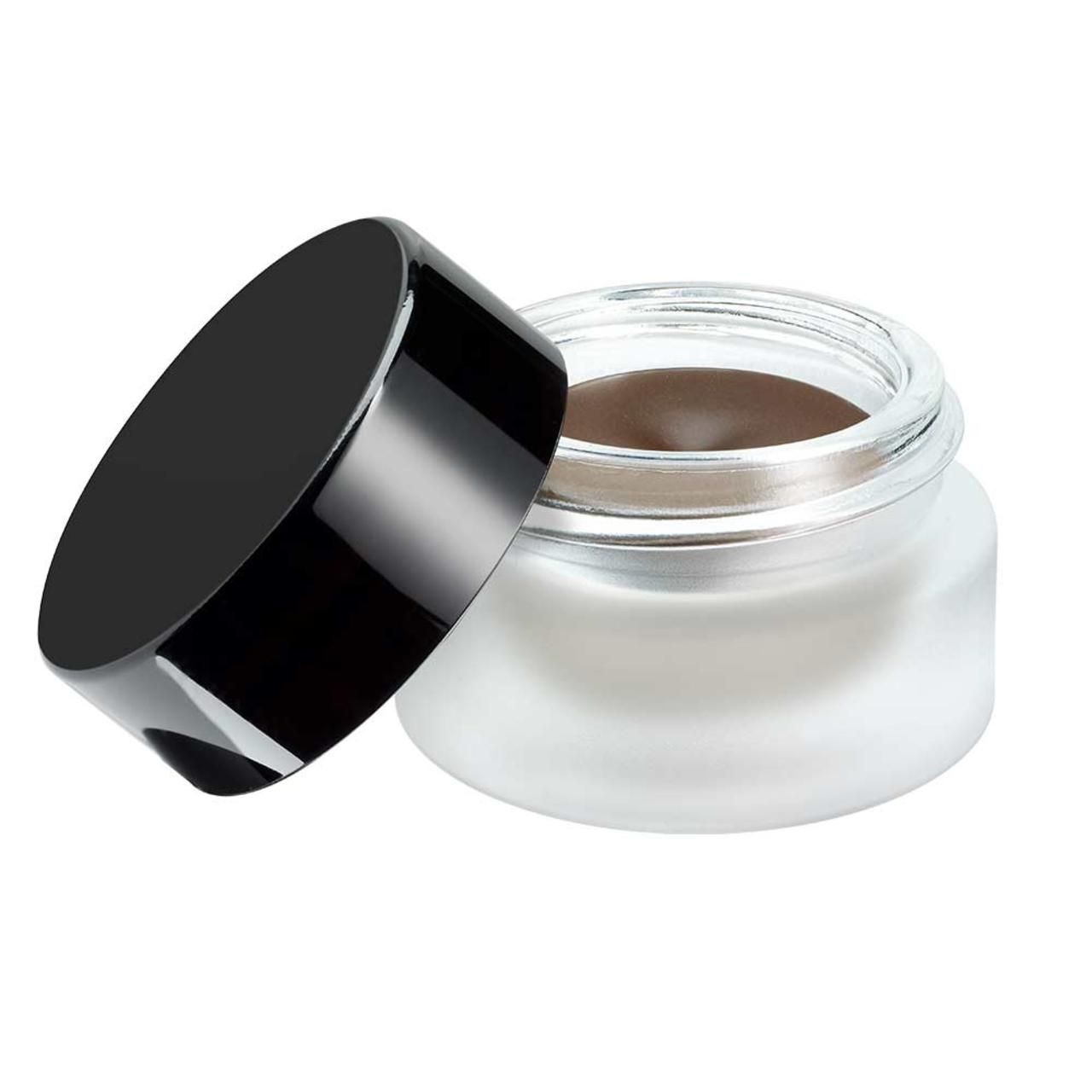 Artdeco Gel Cream for Brows. Braune Augenbrauencreme in einem Glasbehälter mit schwarzem Deckel. Deckel daneben.