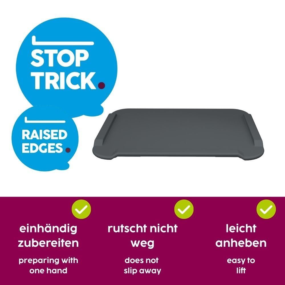 Schneidebrett mit erhöhtem Rand. "Stop Trick" und "Raised Edges". Einfache Zubereitung, rutschfest, leicht anhebbar.