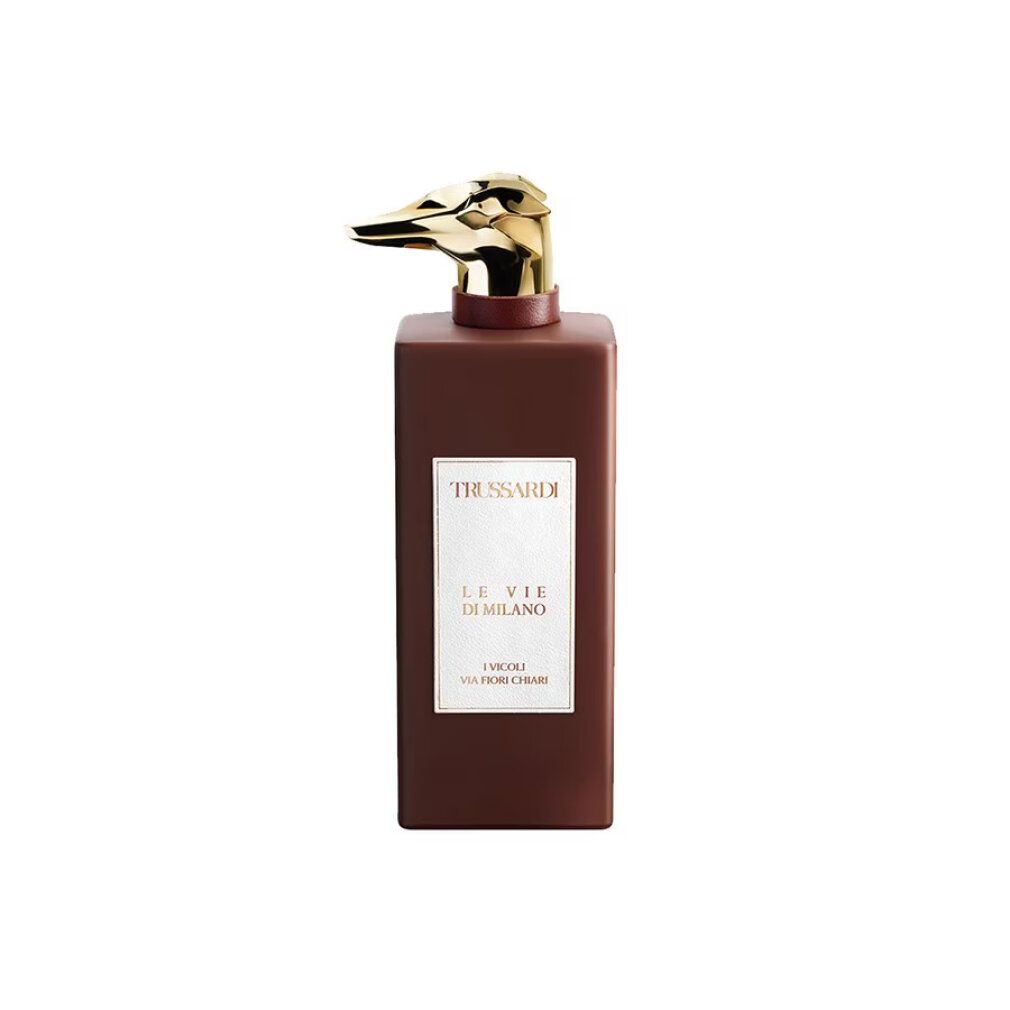 Braune Parfümflasche mit goldfarbenem Tierkopfverschluss und weißem Etikett.