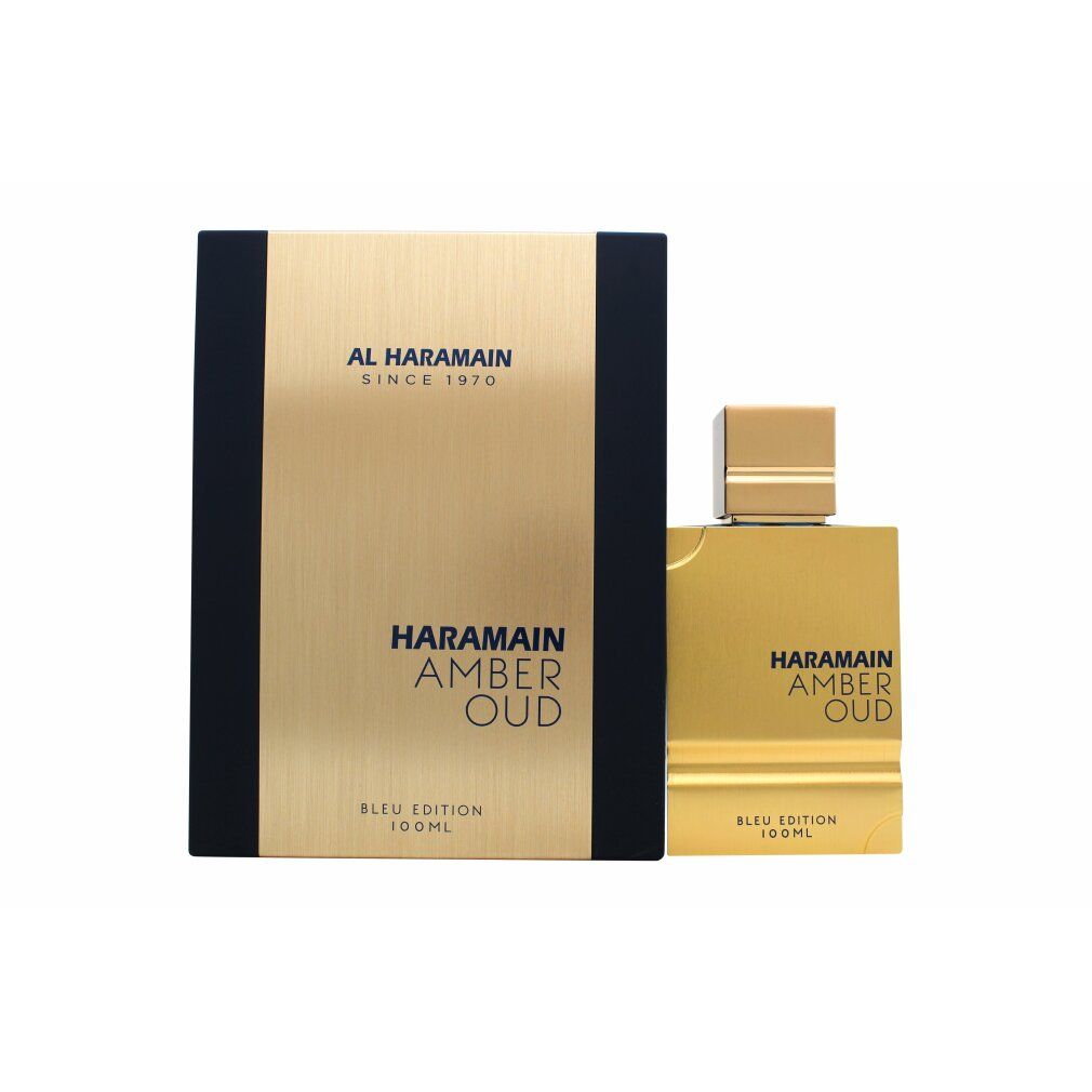 Goldfarbener Flakon und Verpackung. Schwarze Akzente. Aufschrift: HARAMAIN AMBER OUD BLEU EDITION. 100ML. Marke: AL HARAMAIN SINCE 1970.