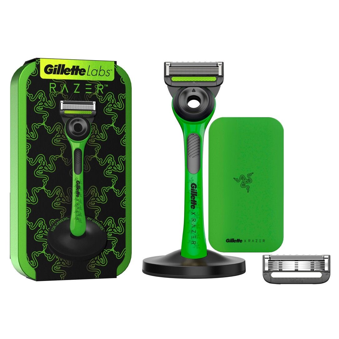 Rasierapparat mit grünem Griff, schwarzem Ständer und Ersatzklingen. Verpackung mit Gillette Labs und Razer Logo.