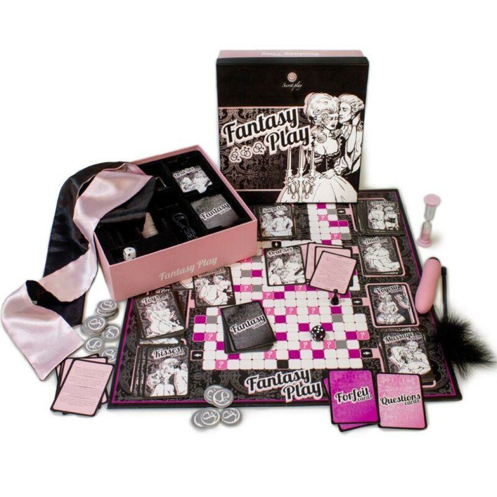 Brettspiel mit Spielkarten, Würfeln, Sanduhr, Münzen, Feder, Seidentuch und Zubehör. Rosa und schwarze Verpackung mit dem Schriftzug "Fantasy Play".