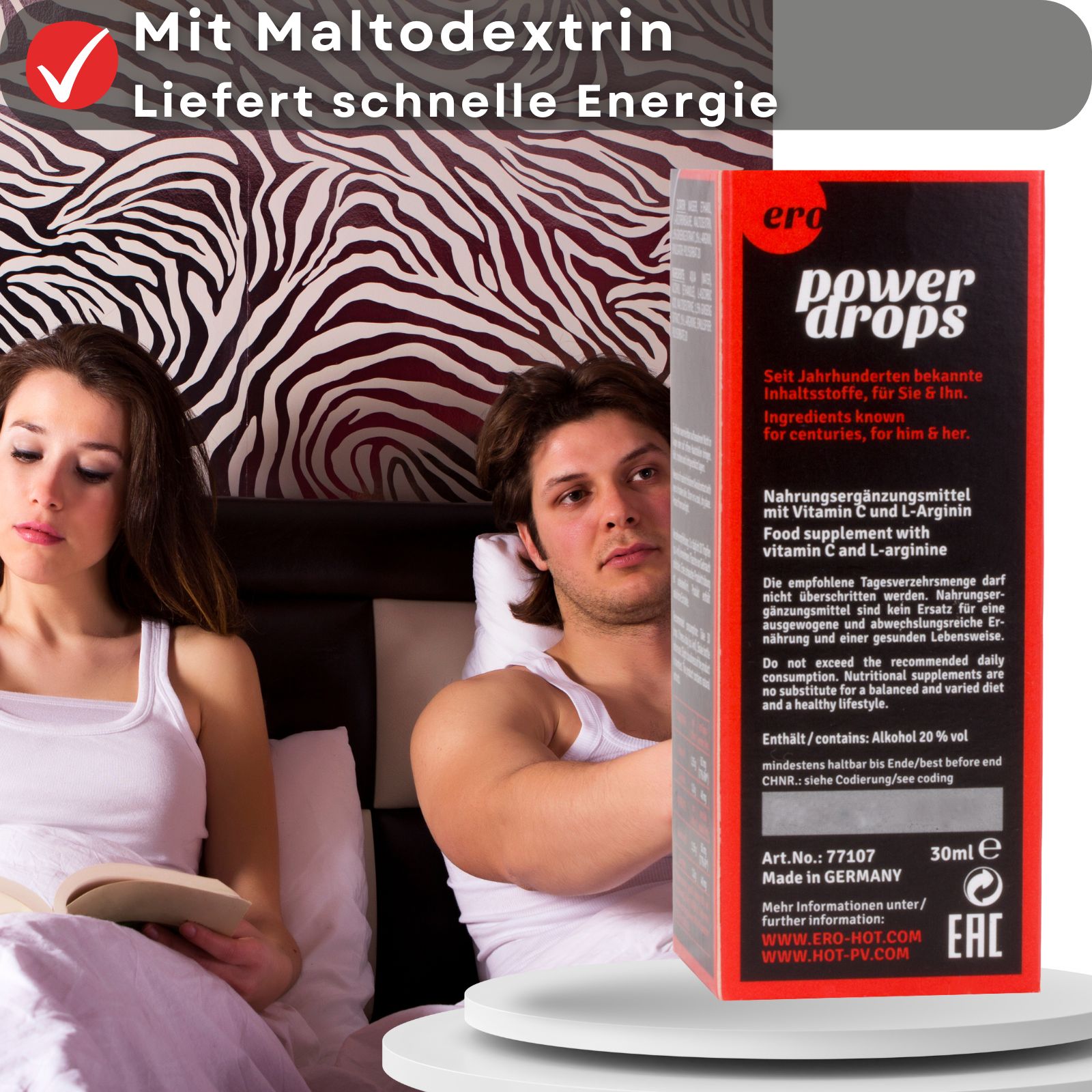 Paar im Bett. Neben ihnen: Produkt Ginseng Power Drops und Verpackung. Aufschrift: Power Drops, Ginseng, 30ml, 1.0fl.oz. Marke: ero.