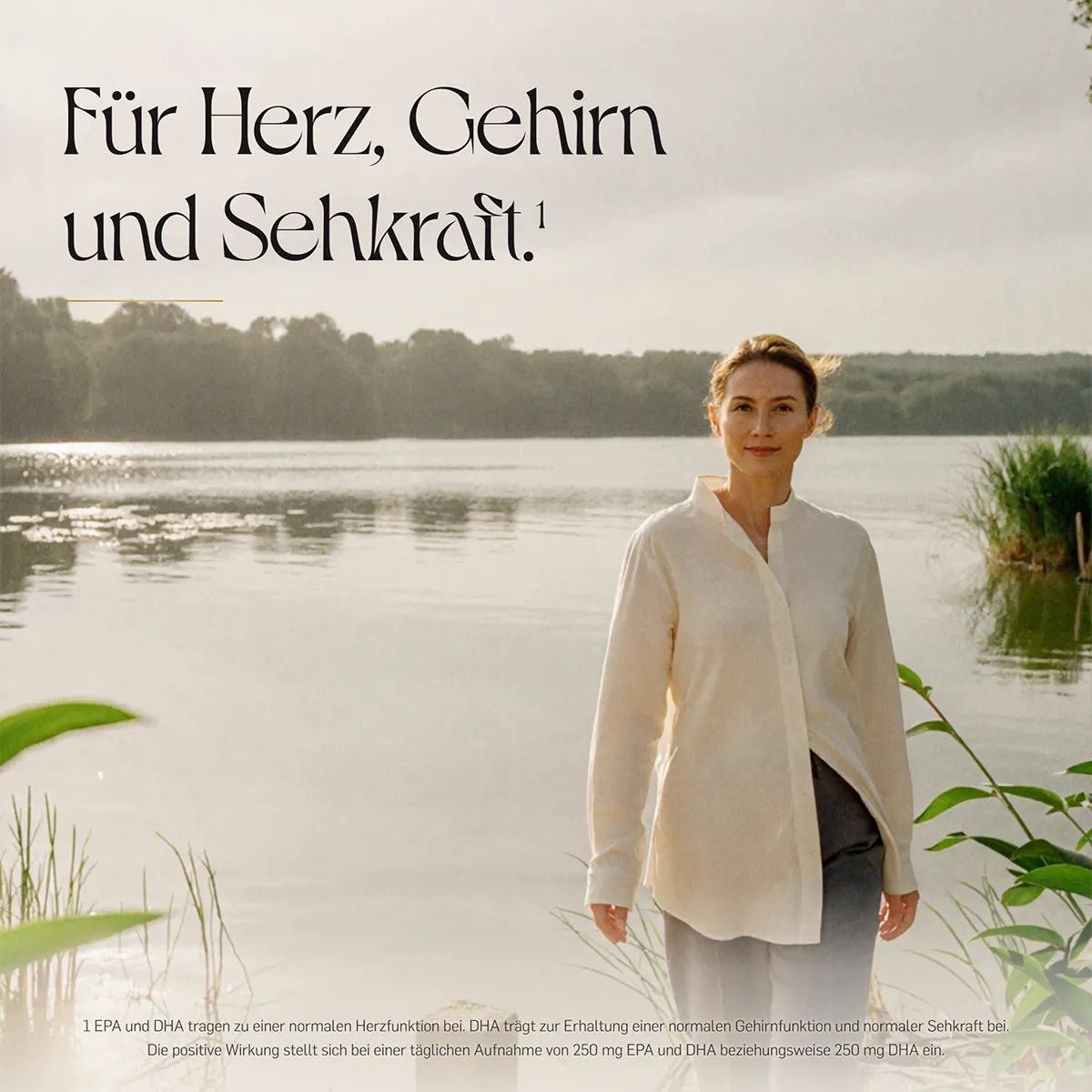 Frau am Seeufer, mit Text über die positiven Effekte von EPA und DHA auf Herz, Gehirn und Sehkraft.