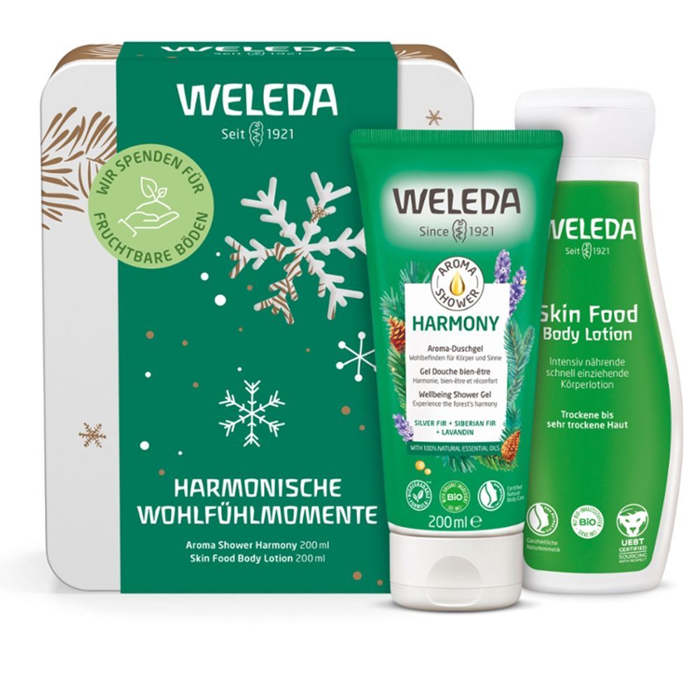 Geschenkset mit Box, Duschgel und Bodylotion. Weleda-Logo und Produktnamen. Grüne Verpackung. Bio-Siegel.