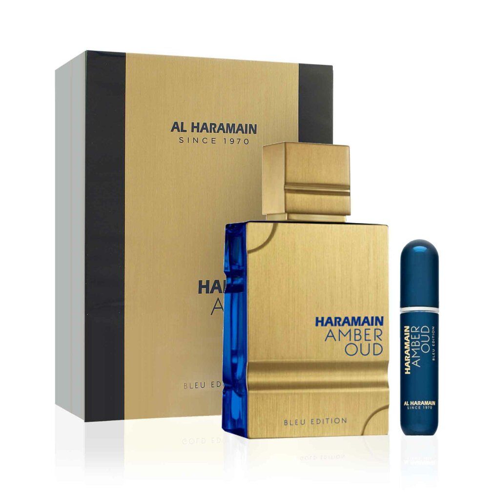 Parfümflasche und Zerstäuber mit goldfarbenem Deckel und blauer Basis. Verpackung mit Markenlogo und Produktnamen.