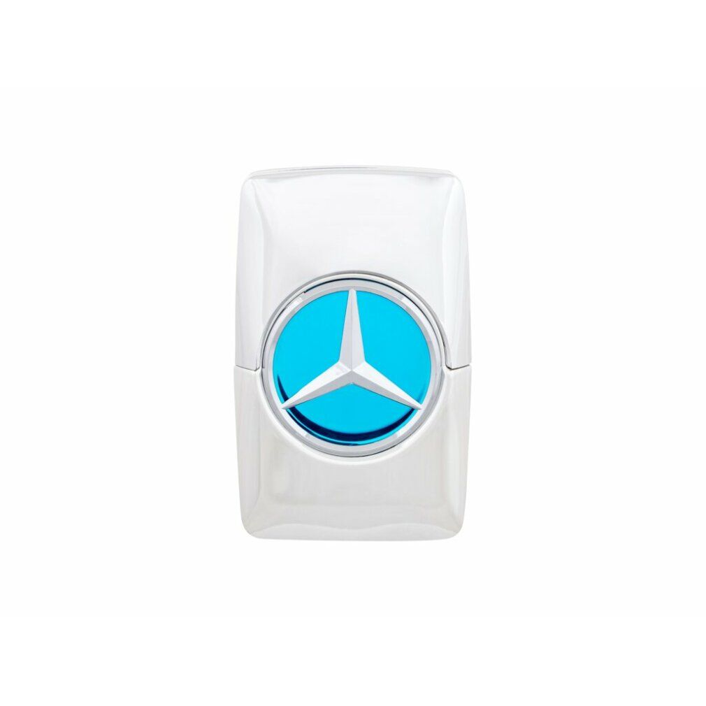 Silberfarbener Flakon mit blauem Kreis und Mercedes-Benz Logo. Rechteckige Form.
