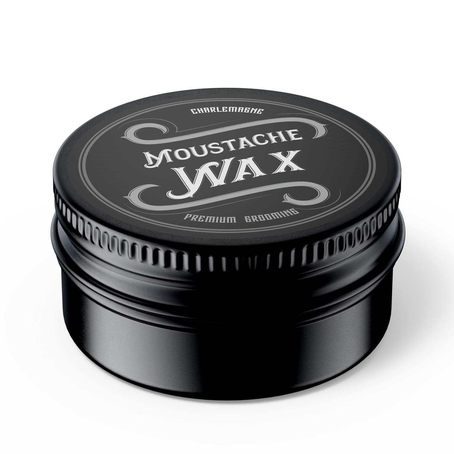 Runde, schwarze Dose mit silberner Aufschrift „Moustache Wax“. Deckel mit geriffelter Kante. „Premium Grooming“.