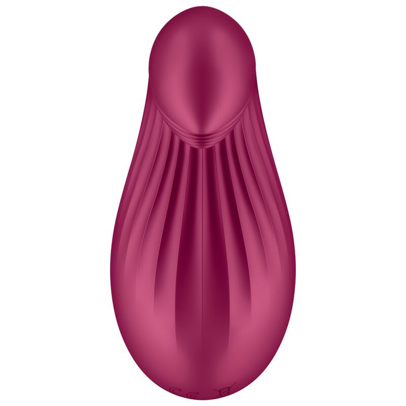 Roter Lay-on Vibrator mit geriffelter Oberfläche, von oben betrachtet.