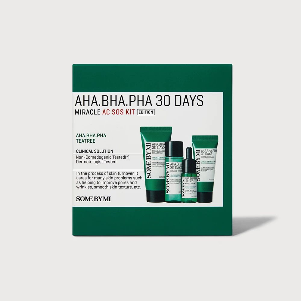 Grüne Schachtel mit Hautpflegeprodukten. Enthält Tuben und Flaschen. Text: AHA.BHA.PHA 30 DAYS MIRACLE AC SOS KIT.