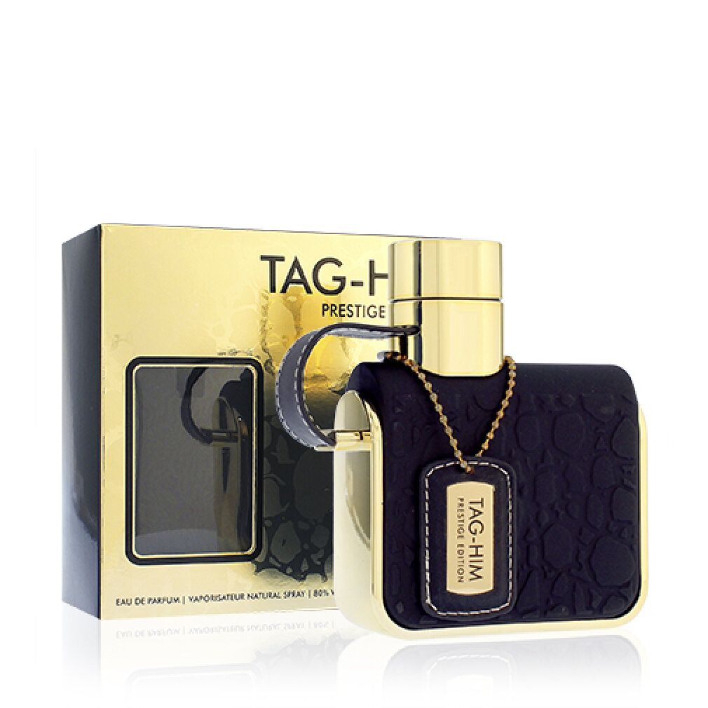 Dunkelblauer Flakon mit goldfarbenen Akzenten und Anhänger. Goldfarbene Verpackung mit Produktnamen.