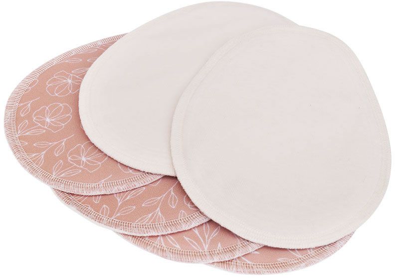 Stilleinlagen, rosa mit floralem Muster und weiße. Ovale Form, mehrere Lagen. Teilweise überlappend.