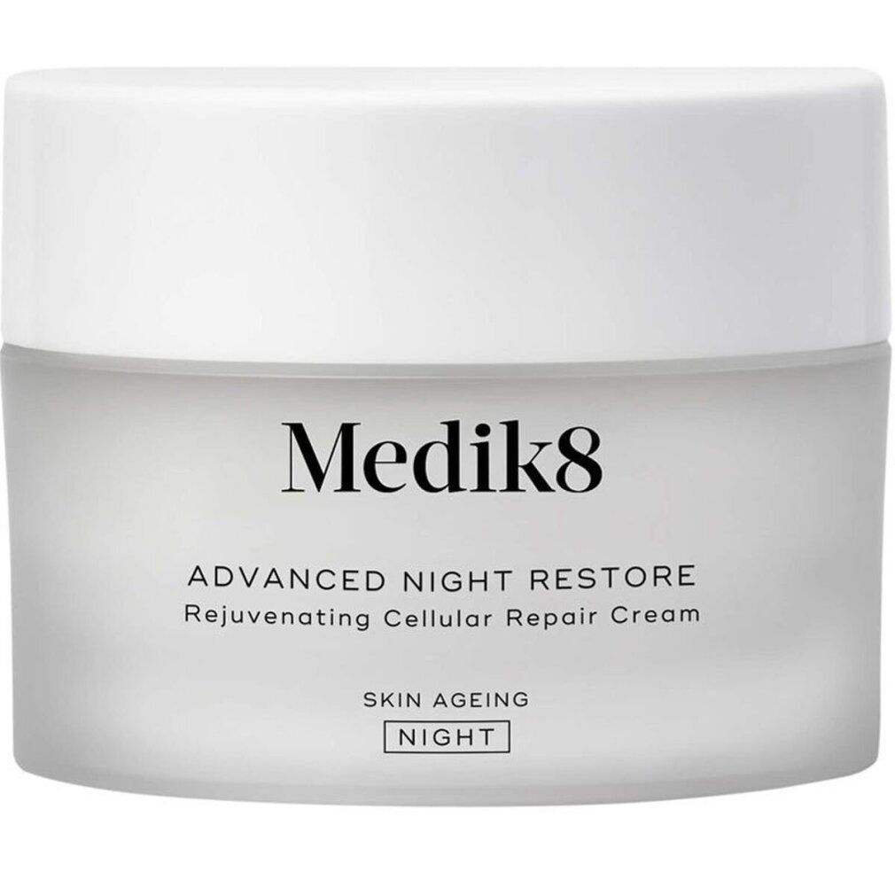 Weißes Tiegel mit Deckel. Aufschrift: Medik8, Advanced Night Restore. Text: Rejuvenating Cellular Repair Cream. Skin Ageing Night.