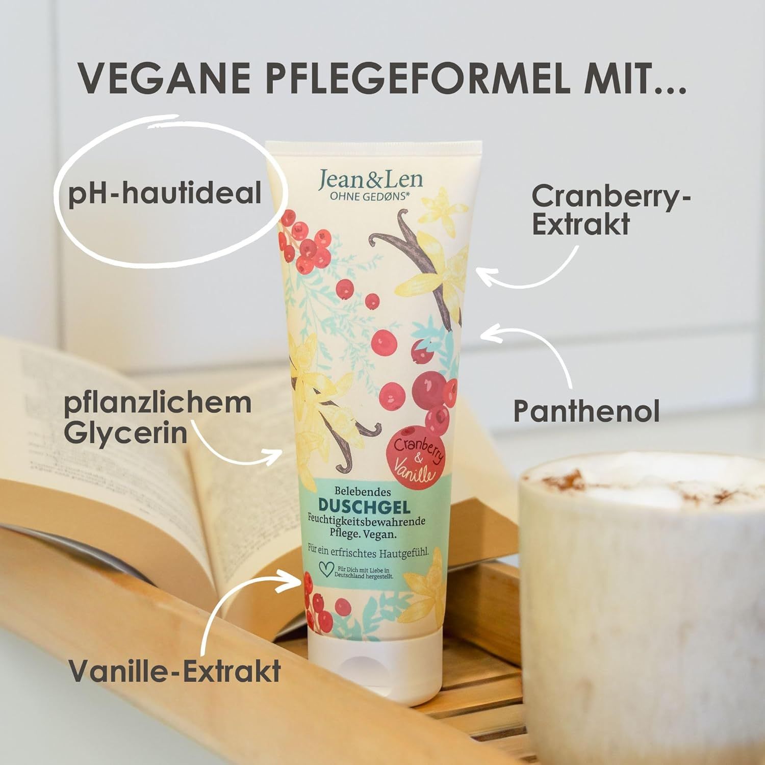 Duschgel-Tube mit Cranberry- und Vanille-Extrakt. Beschriftung: "Jean & Len". Pfeile zeigen auf Inhaltsstoffe: Glycerin, Panthenol.
