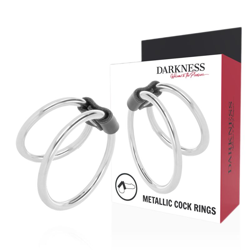 Verpackung mit zwei doppelten Penisringen aus Metall. Marke: Darkness. Text: Metallic Cock Rings.