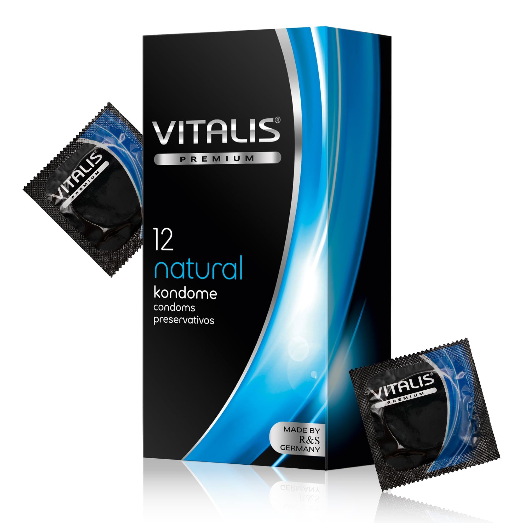 Vitalis Premium Kondome Natural, 12 Stück. Zwei einzeln verpackte Kondome liegen neben der Packung.