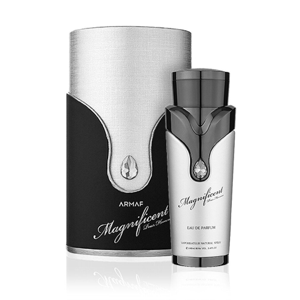 Flakon und Verpackung. Silberne Verpackung, schwarzer Boden. "Armaf Magnificent Pour Homme"-Schriftzug.