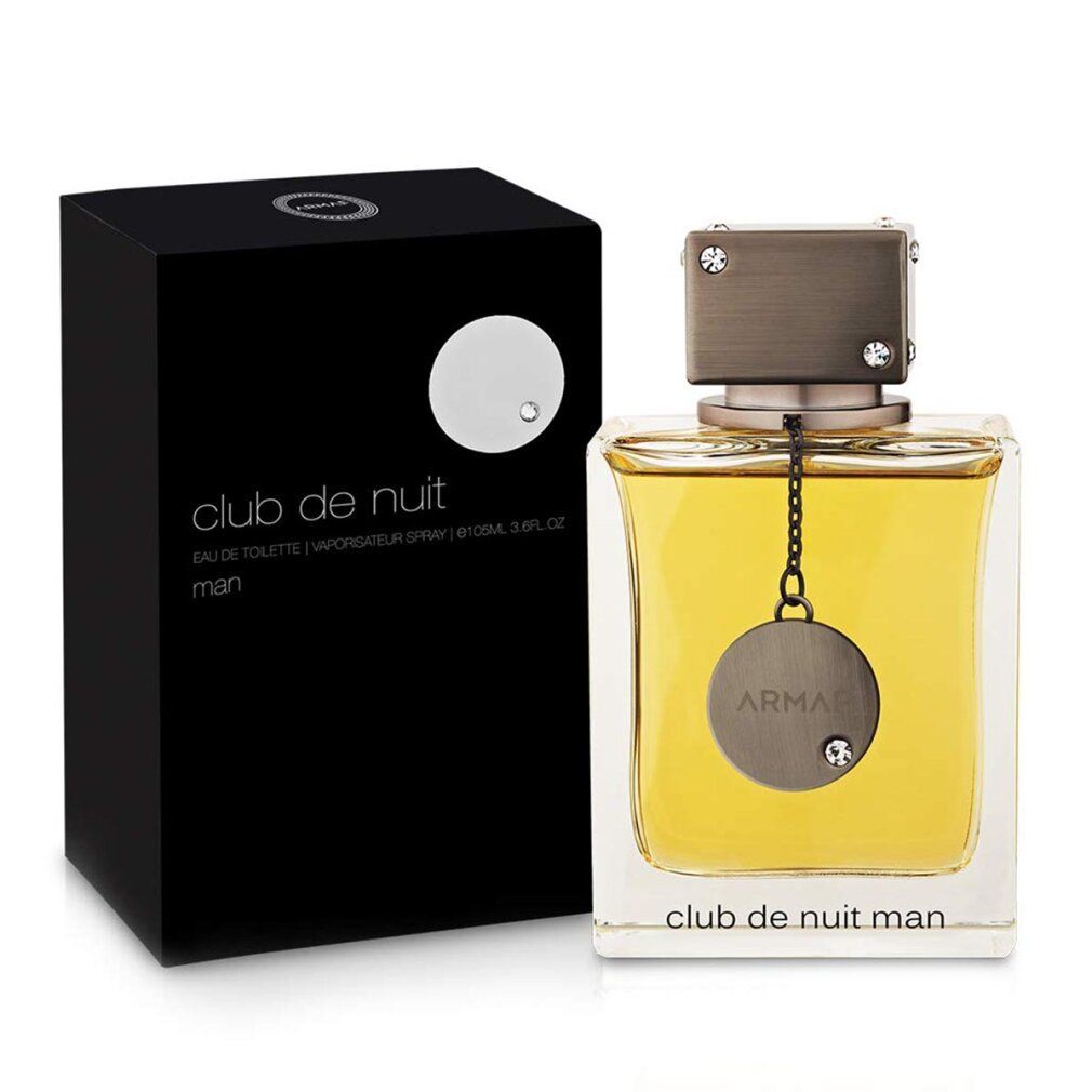 Club de Nuit Man Flakon und Verpackung. Schwarze Verpackung mit weißem Kreis. Flakon mit silberner Kappe und Anhänger.