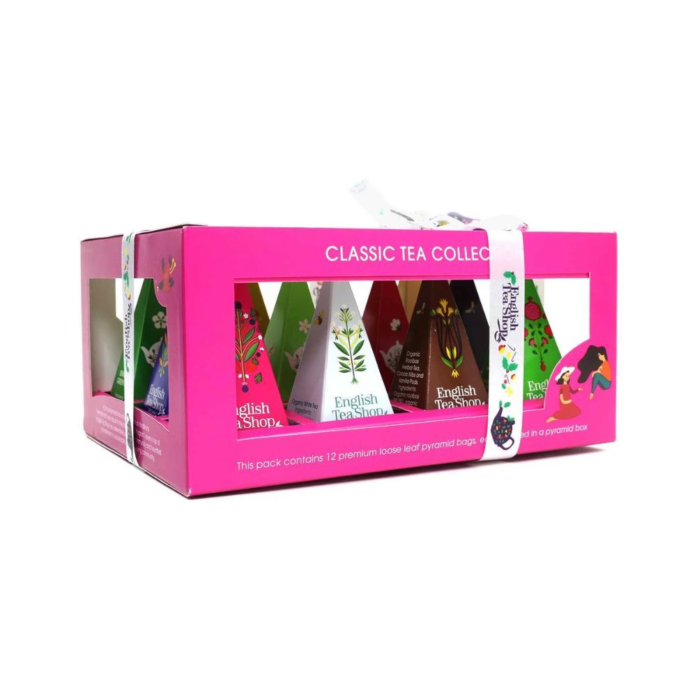 Rosa Geschenkbox mit Teebeuteln. Aufschrift: Classic Tea Collection. Sichtfenster mit Teebeuteln in Pyramidenform.