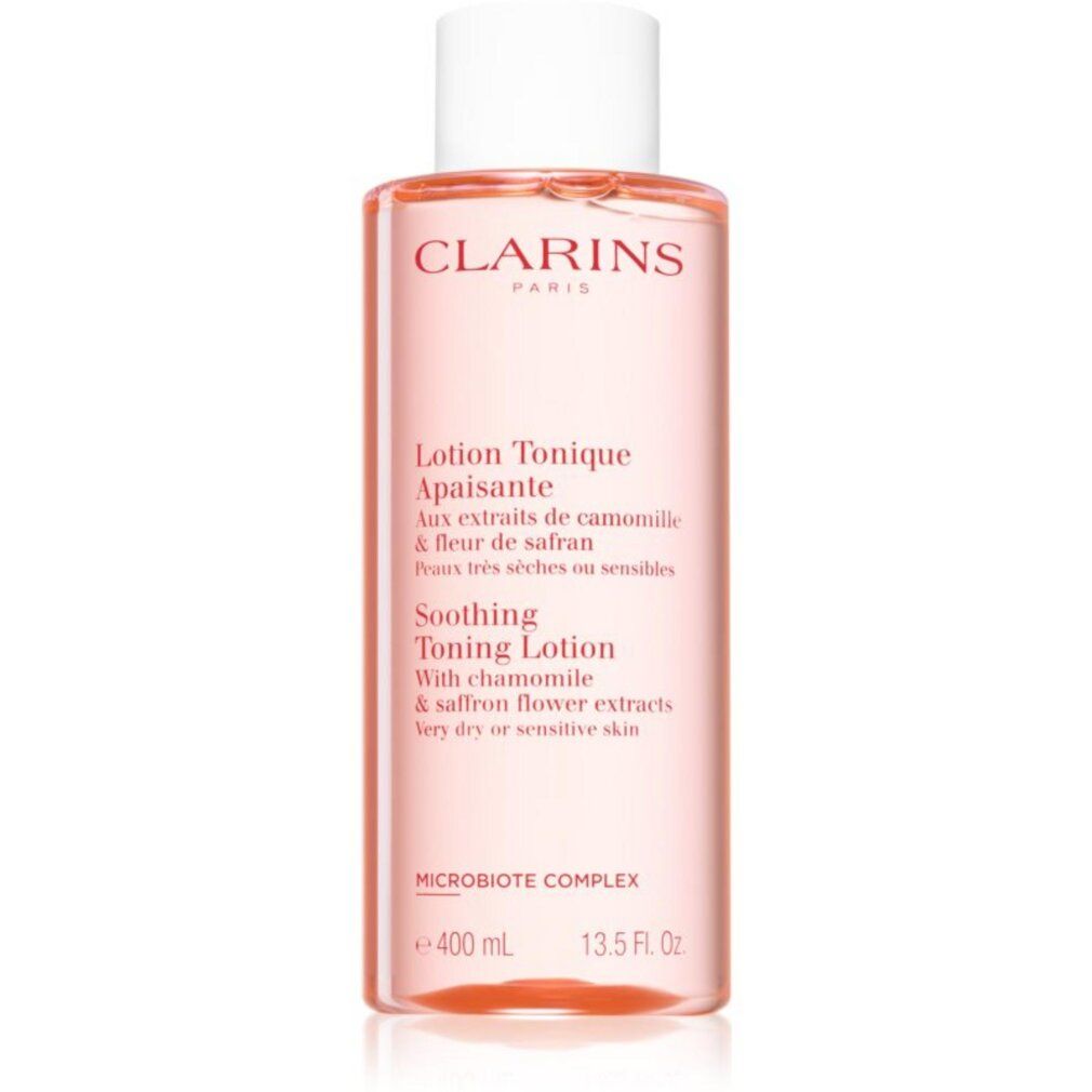 Rosa Flasche mit weißem Deckel. Beschriftung: CLARINS, Lotion Tonique Apaisante, 400 ml, 13.5 Fl. Oz. Text in Französisch und Englisch.