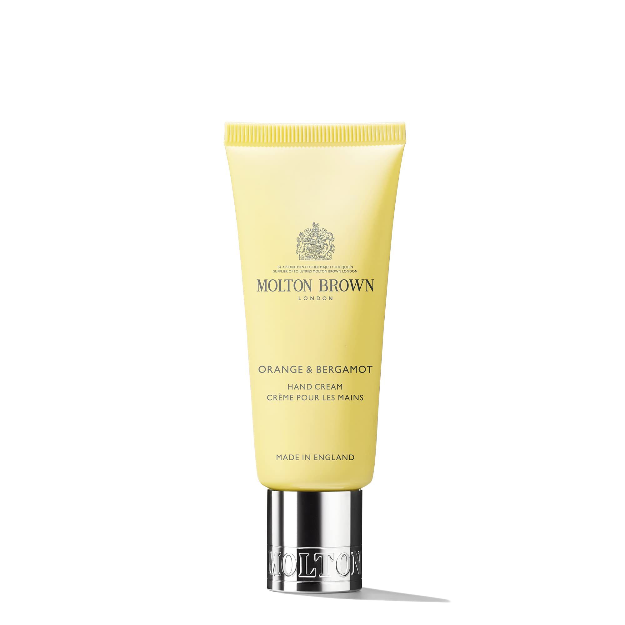 Gelbe Tube Molton Brown Orange & Bergamot Hand Cream mit silbernem Verschluss.