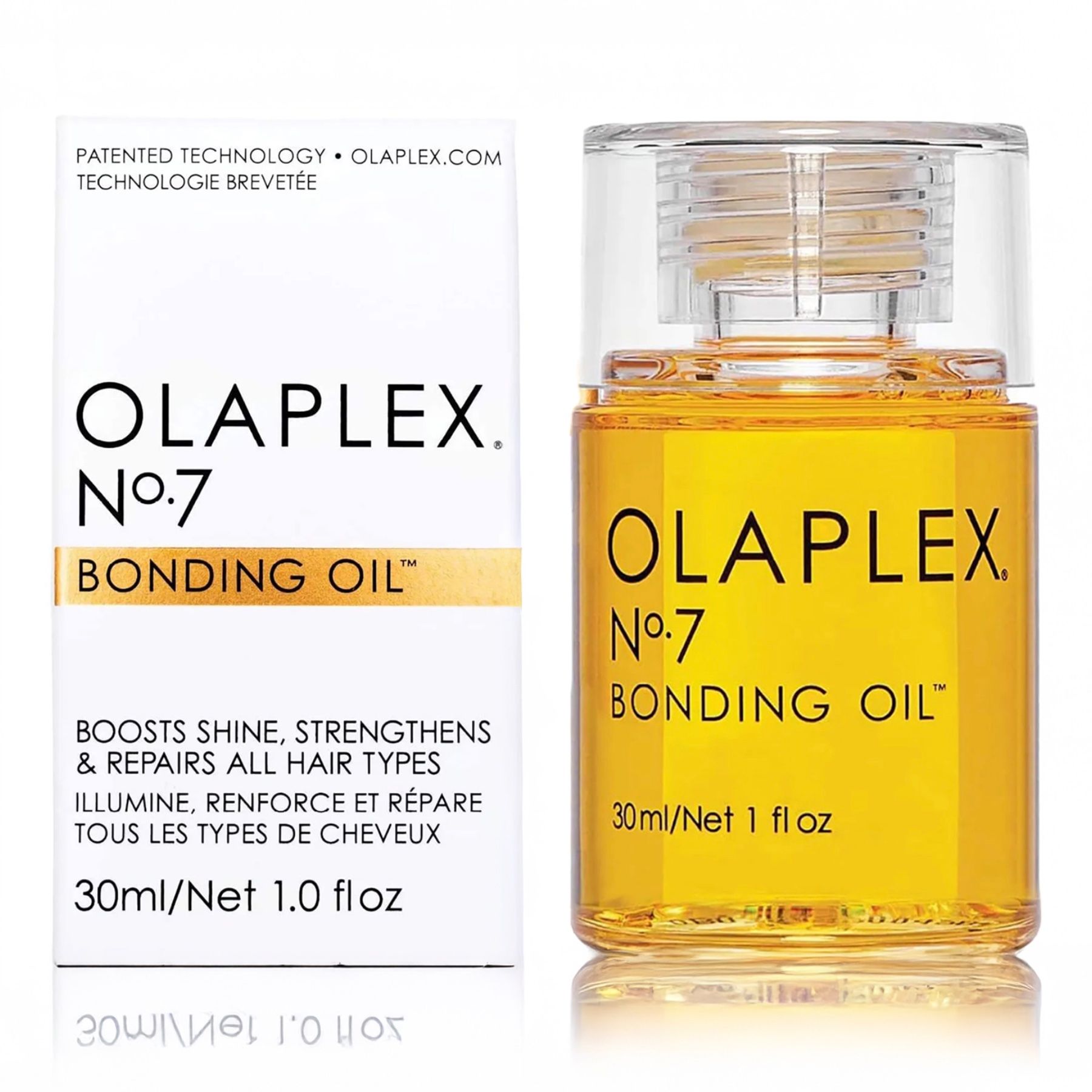 Haarölflasche und Verpackung. Aufschrift: OLAPLEX Nr.7 Bonding Oil. Mit Text.