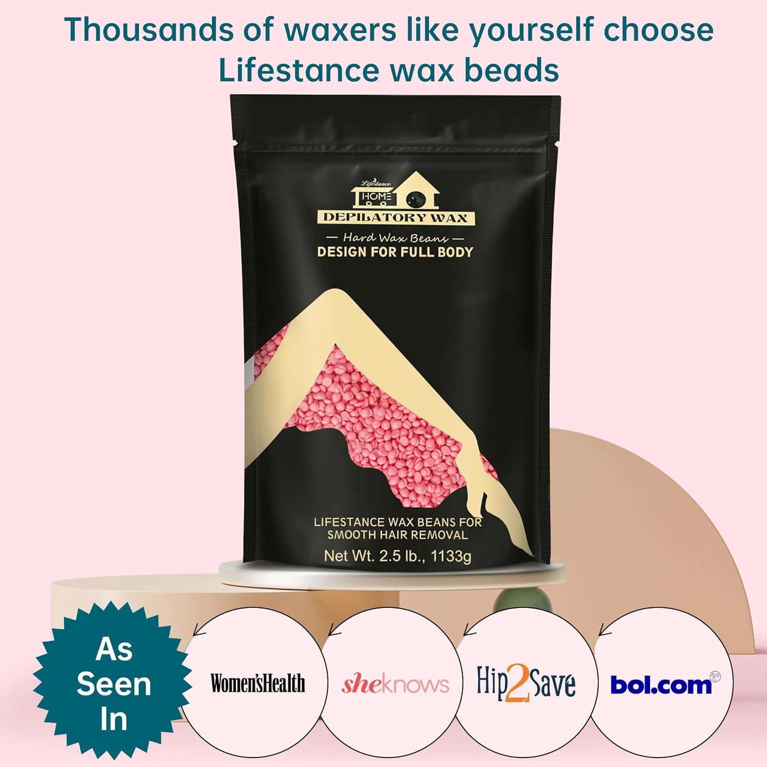 Schwarze Verpackung mit rosa Wachsperlen. Text: Lifestance, Enthaarungswachs, Design für den ganzen Körper. Erwähnt in Women's Health, sheknows, Hip2Save, bol.com.