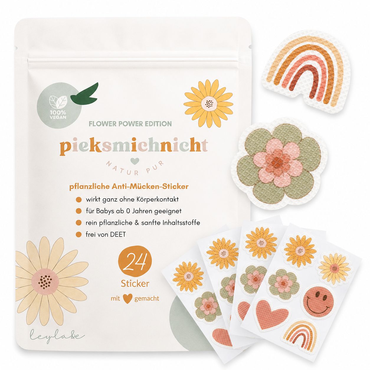Verpackung mit Anti-Mücken-Stickern, Flower Power Edition. Mehrere Sticker-Designs sichtbar.