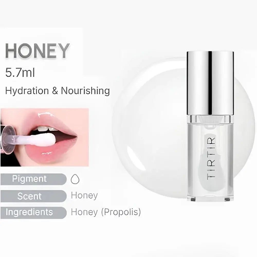 TIR TIR My Glow Lip Oil Honey. Flasche mit silberner Kappe. Text: Honey, 5.7ml, Hydration & Nourishing. Lippenanwendung.