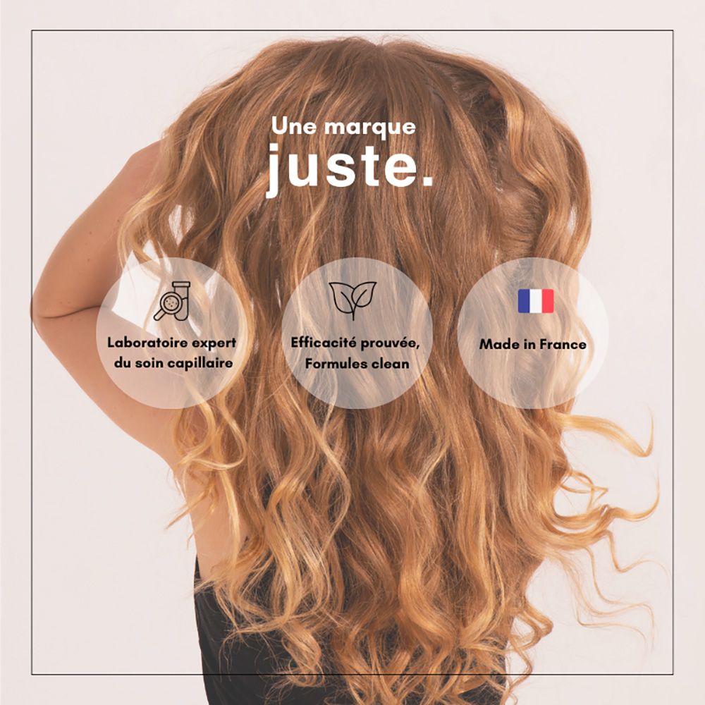 Rückansicht einer Frau mit welligem Haar. Text: Eine Marke Juste. Labor, Wirksamkeit, Made in France.