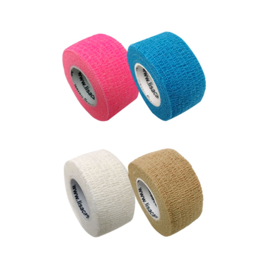 Vier Rollen elastisches Pflaster in Pink, Blau, Weiß und Beige.