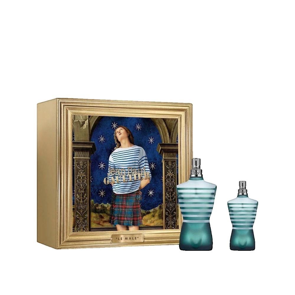 Geschenkset mit zwei Flakons in Torsoform, türkis-transparent mit weißen Streifen. Goldfarbene Box mit Bild.