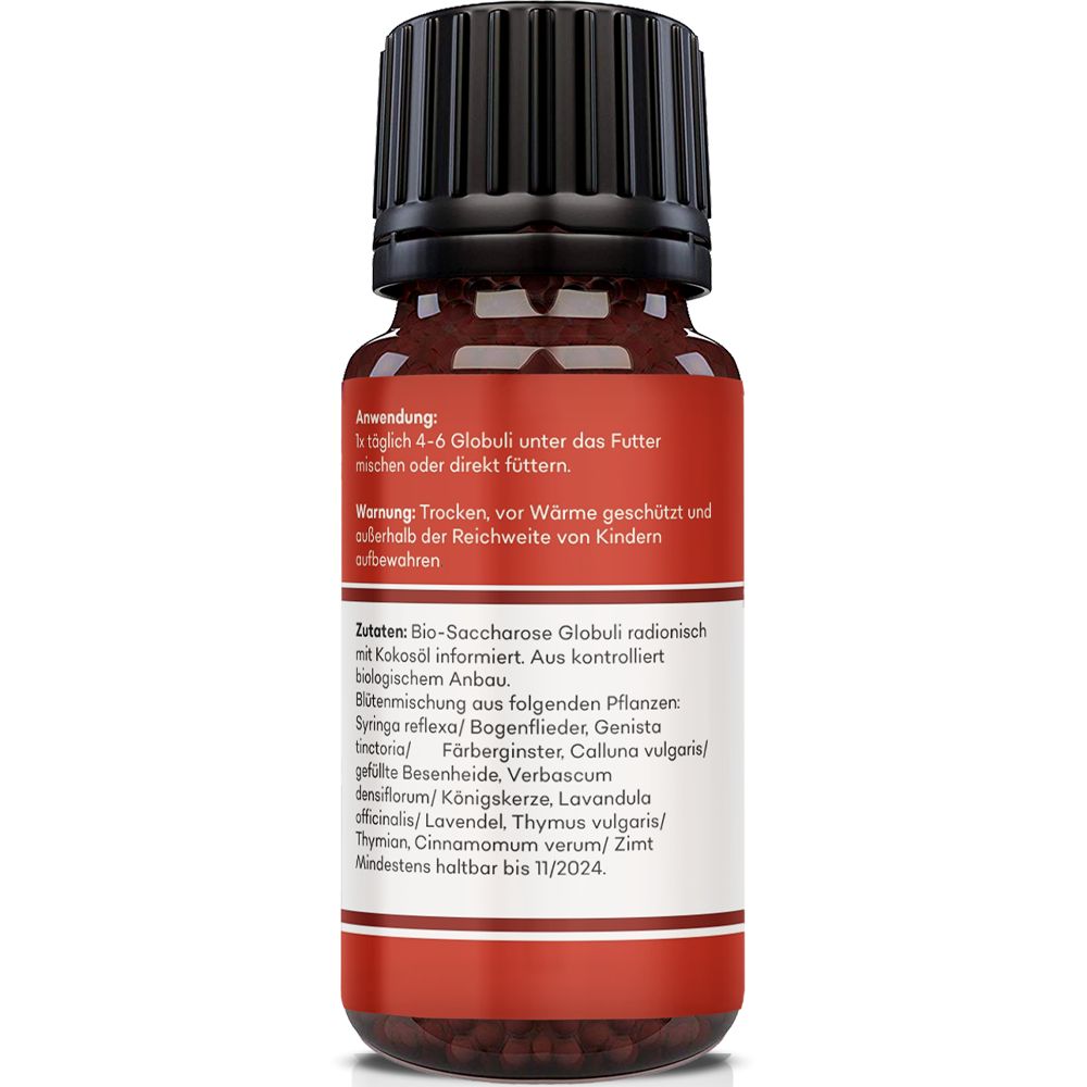 Rückseite der braunen Glasflasche. Rotes Etikett mit Text: Anwendung, Warnung, Zutaten. Mindestens haltbar bis 11/2024.