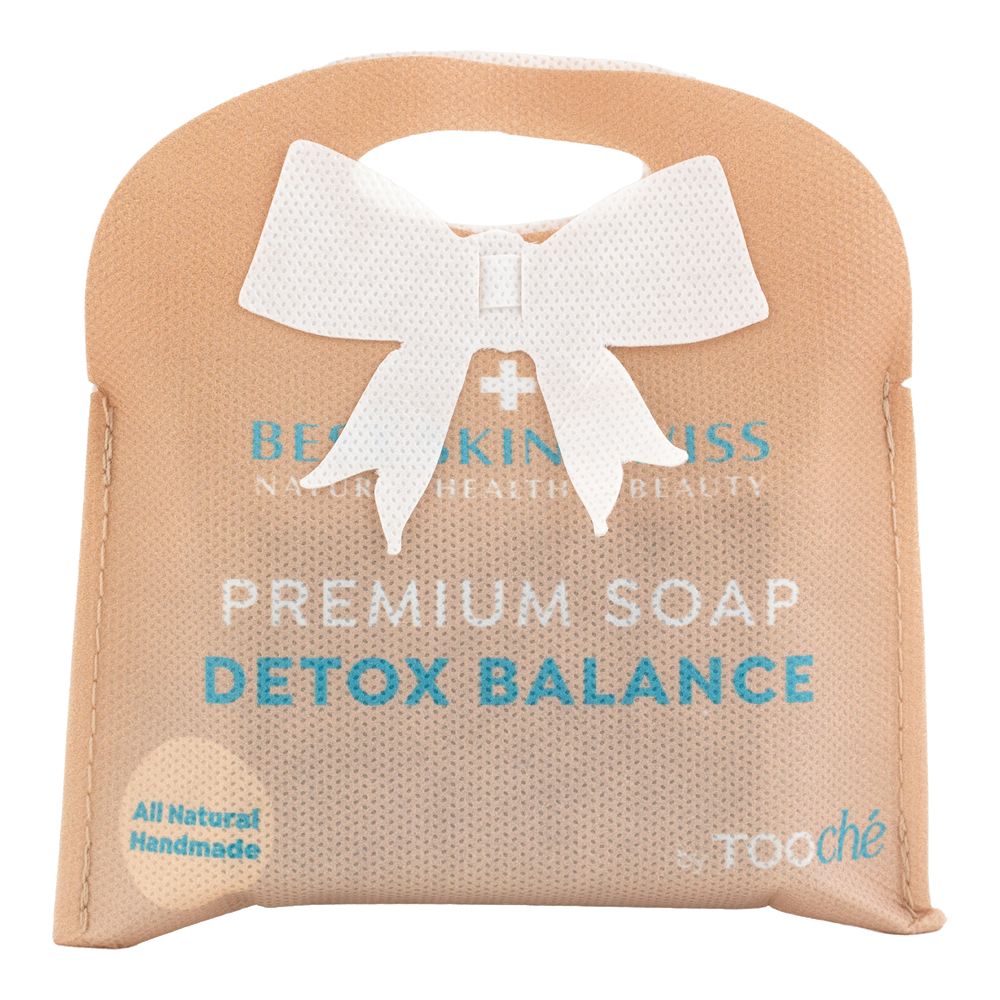 Verpackung mit Schleife. Aufschrift: Premium Soap Detox Balance. Marke: Tooché. Text: All Natural Handmade.