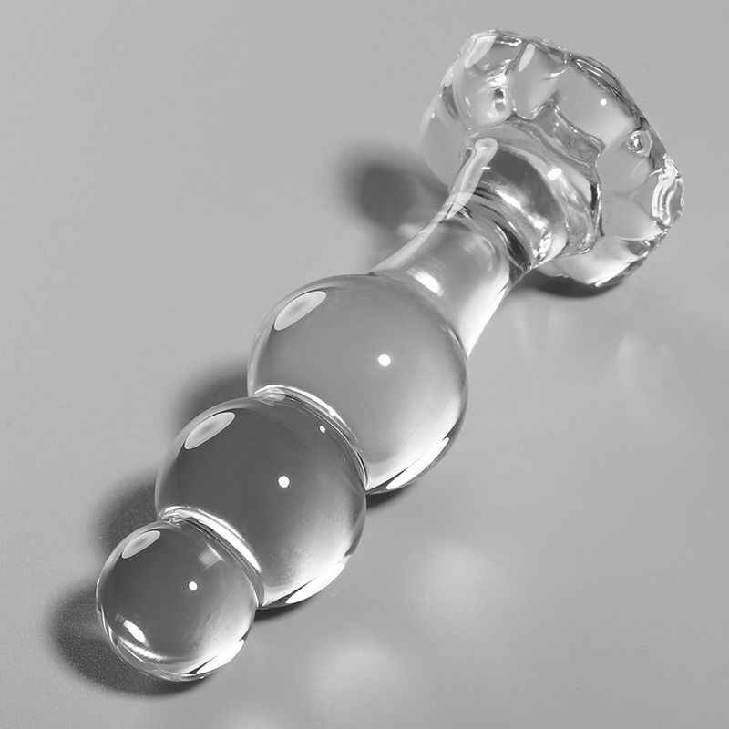 Klarer Glasanalplug mit drei Kugeln und breiter Basis. Maße 10,5 cm Länge, 3 cm Breite.