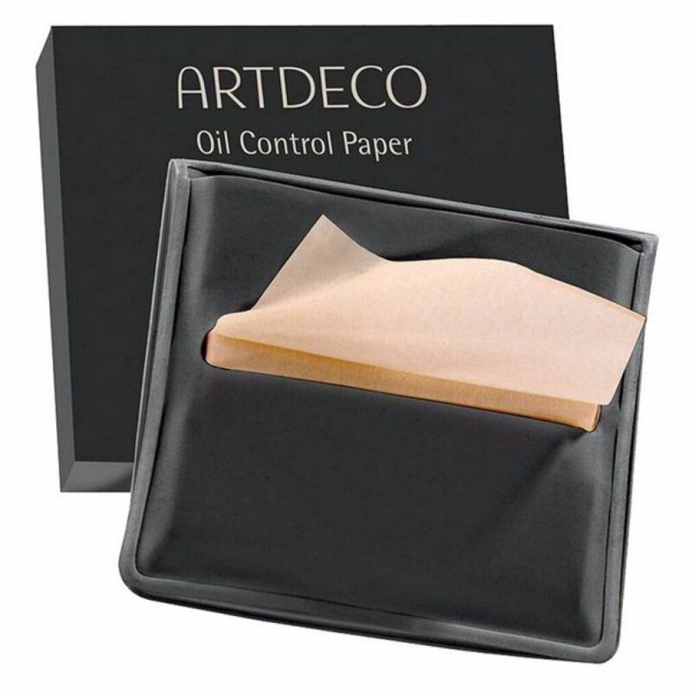 Schwarze Verpackung mit "ARTDECO Oil Control Paper"-Aufdruck. Ölpapiere in einem schwarzen Halter.